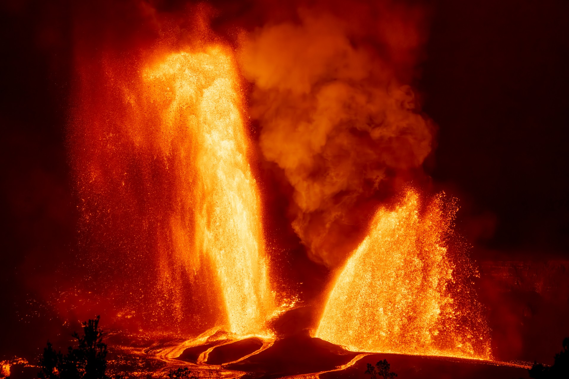 Kīlauea erupting at night, lava glow in caldera, Big Island Hawaii